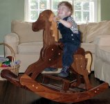 Ethan enjoying the rocking horse -small.JPG