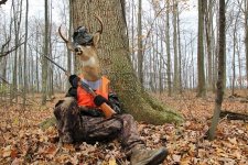 23884262-vengeance-eight-point-buck-in-full-camouflage-holding-a-shotgun-waits-for-the-hapless...jpg